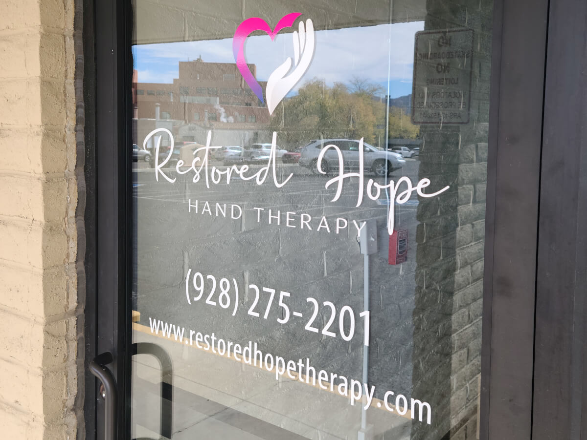 Front door signage of Restored Hope Hand Therapy